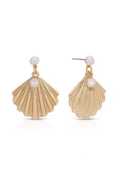 Online only! Elevate your coastal style with Ettika's Scallop Shell & Pearl Earrings, featuring an elegant seashell-shaped design adorned with a lustrous faux pearl accent. Finished in gold, these earrings add a touch of seaside glamour to any outfit.


	18k Gold Plated, Zinc, Freshwater Pearl
	1.2" length
	Post-back closure
	Gold finish Elegant Shell-shaped Earrings With Pearl Charm, Elegant Shell-shaped Metal Earrings, Elegant Shell-shaped Earrings, Elegant Shell With Pearl Charm, Elegant Shell Dangle Earrings, Elegant Shell-shaped Pearl Earrings, Elegant Shell-shaped Metal Jewelry, Elegant Dangle Shell Earrings, Elegant Pearl Charm Earrings With Shell