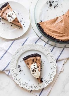 two plates with slices of chocolate pie on them