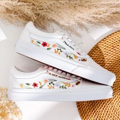 '' Wedding Embroidered Vans for Bride and Groom, Bridal Flowers Embroidered Vans Shoes, Bridal Floral Embroidery Vans Slip On Custom, Personalized Bridal Vans, Wedding Gifts ' 🍀 Price includes Converse Shoes and Floral Embroidery Designs as shown 🍀 🍀 Shoe Type: Vans 🍀 Shoe color:3. Oldskool White 1. DETAILS 🍀 You can send me your Converse, Vans, canvas shoes or I can buy them for you. Custom-ordered embroidered Vans and Converse shoes, please wait another 2-4 days. Each pair is hand embroidered to order, please make sure you put in the correct shoe size before you check out. The embroidery is meticulous and does not fade. 🍀 You will receive Vans and Converse shoes with floral embroidery designs as above. 2. PERSONAL EXPRESSION 🍀 Create your unique vibe by your own design of embroide Vans Wedding Shoes The Bride, Vans Custom Ideas, Bridal Vans, Vans Wedding, Vans Canvas Shoes, Floral Embroidery Designs, Embroidered Vans, Wedding Shoe Ideas, Embroidered Converse