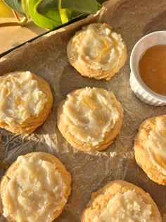 some cookies are sitting on a piece of wax paper