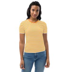 This Orange And White Striped Women's T-shirt is a trendy and stylish addition to any wardrobe. Made from a blend of 95% polyester and 5% elastane, it offers a comfortable and stretchy fit that hugs your curves in all the right places. The vibrant orange and white stripes add a pop of color to your outfit, making it perfect for both casual and dressier occasions. With its regular fit, this t-shirt is versatile and can be paired with jeans, shorts, or skirts for a chic and effortless look. Whether you're heading out for a day of shopping or meeting up with friends, this t-shirt is a must-have for any fashion-forward woman. See more striped clothing + FEATURES + 95% polyester, 5% elastane (fabric composition may vary by 1%) Premium knit mid-weight jersey Four-way stretch fabric that stretche Yellow Fitted Crew Neck Top, Trendy Striped Short Sleeve T-shirt, Fitted Yellow Summer T-shirt, Orange Stretch Cotton Tops, Fitted Yellow T-shirt For Summer, Fitted Striped T-shirt For Spring, Summer Striped Stretch T-shirt, White Fitted Casual T-shirt, Striped Stretch T-shirt For Summer