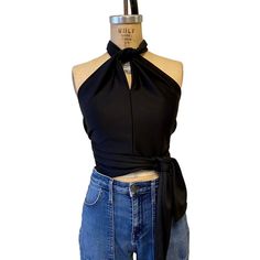 This 1970s glam halter tie top is perfect for clubbing or the holiday season.  Just throw on your favorite pair of jeans and you are good to go.  This cool little top can be tied 4 different ways or maybe even more.  Beautifully made from a vintage pattern and featured in our selection of gorgeous stretch fabric.   We recommend that you hand wash your garment in cold water and lay flat to dry for a longer life. ------------------------------------------------------------------------------------- Spring Evening Halter Neck Top, Halter Neck Tops For Spring Evenings, Evening Halter Neck Top For Spring, Halter Neck Top With Tie Back For Evening, Trendy Fitted Halter Top For Night Out, Glamorous Evening Halter Top For Spring, Elegant Spring Club Halter Top, Fitted Halter Top For Going Out In Summer, Elegant Halter Top For Club And Spring Festivals