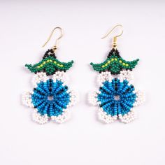 the beaded earrings are made with beads and beads, which look like they have flowers on