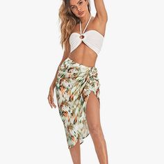 Floerns Women's Boho Floral Print Split Thigh Satin Ruched Midi Skirt. Multi Color Tie Dye. Fold Pleated Ruched Side, Asymmetrical Split Thigh, Various Printing Style, Knee Length Skirt. #174 White Beachwear Mini Skirt, Spring Beach Mini Skirt With Tie-side Bottom, Spring Beach Mini Skirt With Tie-side, Green Skirt Bottoms For Beach, White Summer Skirt For Beach Party, High Waist Green Bottoms For Beach Party, White Split Bottoms For Beach Season, White Split Skirt For Vacation, Casual White Split Bottoms