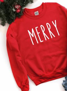 "This simple \"Merry\" Christmas Sweatshirt is the perfect cozy pullover. SWEATSHIRT DETAILS: >>Adult Sizes - Gildan UNISEX sizing (please check size chart!) - Heavyweight (8 oz) - 50% cotton 50% polyester - Crewneck Pullover >>Toddler Sizes - Rabbit Skins Toddler Unisex - 7.5 oz. - Cotton/Polester Blend - Crewneck Pullover You will receive an email with tracking information when your order ships. *Thank you for shopping small = )" New Year Shirt Design, T Shirt Design Funny, Christmas Shirt Designs, Happy New Year Shirt, Sweater Designs, T Shirt Design Png, New Year Shirt, Book Stores, Womens Christmas