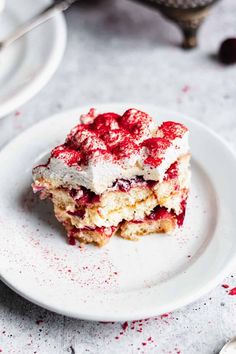 two pieces of cake on a white plate