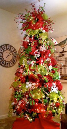 a christmas tree with red, green and white decorations