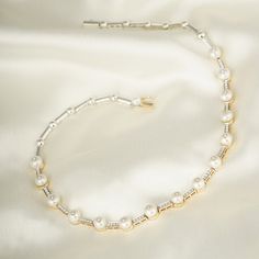 You cannot go wrong with pearls and diamonds, can you? This necklace here is crafted in gold to sit cozily on the nape of your neck, with intermittently placed pearls pierced with diamonds. split Gold(14K) : 15.29g Diamonds : (VS clarity & H-I colour) : (Brilliant cut ) : 0.71ct Gemstone : Chinese Cultured Pearl Silver Alloy split Pearls and diamonds are a match made in heaven! Pair this necklace with your everyday formals or your pastels and you're making an elegant style statement! Pearl And Diamond Necklace, Made In Heaven, Tahitian Pearls, Match Making, Silver Pearls, Style Statement, Elegant Style, Precious Metals, Diamond Necklace