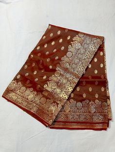 Hand Woven Banarsi Silk Heavy Zari Pallu Bridal Silk Saree With Blouse OFFER- EXTRA 20$ OFF ON PURCHASE OF TWO PRODUCTS. A beautiful, delightful, and absolutely luxurious Banarasi dream! For Instance, The Saree Has where each thread of the Butiy Is knitted by hands. Additionally, It comes In the purest banarasi silk with the pure banarasi silk blouse piece. above all, with vows to sustainable fashion, this silk handloom product from Banaras is a masterpiece involving of brilliance & sheer endeavor of our creative artisans. Tassels vary from the image. Blouse worn by model is for styling purpose only. FABRIC - Banarasi Silk BLOUSE PIECE - Yes TECHNIQUE - This Splendid Masterpiece is made of the finest Fekwa technique of Banaras. WEAVE - Handwoven SILK - 100% Authentic Banarasi Satin Silk Pl Brocade Pre-draped Saree For Diwali Puja, Meenakari Raw Silk Pre-draped Saree For Wedding, Brocade Traditional Wear For Puja During Diwali, Traditional Pre-draped Saree For Wedding And Diwali, Brocade Pre-draped Saree For Wedding And Eid, Wedding Brocade Pre-draped Saree For Eid, Wedding Eid Brocade Pre-draped Saree, Festivals Brocade Pre-draped Saree With Pallu, Wedding Brocade Pre-draped Saree With Self Design