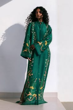 Zuri Spring Green Kaftan With Printed Motifs, Traditional Green Floral Print Kaftan, Traditional Green Floral Kaftan, Traditional Green Kurta With Floral Print, Traditional Green Floral Print Kurta, Green Bohemian Kaftan With Printed Motifs, Festive Green Printed Kaftan, Green Silk Kurta With Floral Print, Green Tunic Kurta For Spring