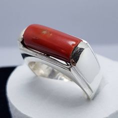 "Red Coral /Moonga 4.00-11.00 Ct. Stone 92.5 Sterling Silver Ring For Men & Women. This ring is suitable for Men & Women having ring sizes between 4.25 to 12.00 as per US ring standards. Size of this ring is easily by hand. Fine quality Red Coral is used to give best results for your astrological needs. Stone will be neat and clean without blemishes. Gemstone is left open from the back side. Gemstone certified by a Well reputed laboratory. This fashionable flat Rings band is dainty and e Flat Rings, Coral Rings, Islamic Ring, Silver Ring For Men, Red Stone Ring, Silver Rings Simple, Devi Durga, Coral Ring, Coral Stone