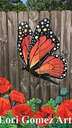 a painting of a butterfly and red flowers on a wooden fence with the words florida gomez art written below it