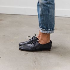 Inspired by the soft glove-like fit of a ballet flat, this chic lace-up is buttery soft. Made using unlined, vegetable-tanned leather from our elite Italian tannery, it's simple & modern with a subtle square toe. Style as your would your favorite sneaker for a grounded subtly menswear look. This Oxford will be your new seasonless staple. Details Modern, streamlined unisex silhouette Unlined for a ballet glove-like fit 100% vegetable-tanned Italian leather upper Comfortable memory-foam padded ins Oxford Shoes Outfit Women's, Oxfords Outfit, Women Oxfords, Flat Lace Up Shoes, Oxford Shoes Outfit, Black Oxford Shoes, 2023 Wardrobe, French Aesthetic, Soft Gloves