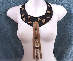 A unique tribal choker to complete your boho style outfit ! *DESIGN* A black genuine  leather choker with tan leather fringe  and  beaded chain. 2 leather ties at the ends for an adjustable fit. *SIZE* free neck size  10 inch length from the middle front  ..   26 cm ** international shipping at letter rate, with no tracking. Upgrades available at checkout. earthy Boho style Thanks for looking, Kathy Bohemian Brown Beaded Choker, Adjustable Boho Collar Necklace For Festivals, Hippie Style Brown Choker Jewelry, Hippie Brown Choker Jewelry, Bohemian Brown Choker For Gift, Bohemian Adjustable Choker For Festivals, Adjustable Bohemian Festival Choker, Hippie Brown Jewelry For Festivals, Brown Festival Choker Jewelry