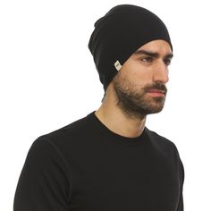 Our Shade beanie is designed to fit well under a helmet on the slopes or to keep you warm while running on a cold winter day. This lightweight hat provides just the right amount of warmth during a high-intensity workout! Reversible so you can have multiple options when trying to keep your head warm. Lightweight Functional Black Hat, Black Sports Beanie For Winter, Black Casual Beanie For Outdoor Activities, Black Beanie With Fleece Lining For Cold Weather, Black Beanie For Outdoor Activities, Black Windproof Sporty Hats, Black Sporty Windproof Hats, Sporty Windproof Black Hat, Sporty Black Windproof Hats