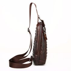 The Veltique Urban Courier Bag is crafted from durable leather with an alligator pattern, featuring a secure zipper and hasp closure, and includes an interior zipper pocket for organized storage, making it a practical choice for casual use. Brown Crocodile Pattern Shoulder Bag For Business, Elegant Leather Shoulder Bag With Crocodile Pattern, Luxury Crocodile Pattern Shoulder Bag For Business, Luxury Leather Bag With Crocodile Pattern, Classic Leather Shoulder Bag With Crocodile Pattern, Leather Shoulder Bag With Crocodile Pattern For Business, Business Leather Shoulder Bag With Crocodile Pattern, Elegant Brown Crocodile Pattern Shoulder Bag, Leather Bags With Crocodile Pattern For Business