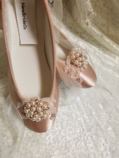 THIS WEEK ONLY! SALE REGULARLY $168, NOW THIS WEEK $139.00 Beautiful modern, and comfortable Rose gold color flat shoes with a splendorous Bling Rose gold brooch! Please order as soon as possible, i only have enough materials for 4 more pairs. THESE SHOES DESIGNS ARE HAND EMBELISHED AND HAND DYED TO ORDER THEREFORE, SHOES CAN NOT BE RETURNED OR EXCHANGED, NO EXCEPTIONS YOU MAY VERIFY YOUR FEET LENGHT SHOE MEASUREMENT TO GET THE RIGHT SIZE SHOES, PLEASE USE GUIDE PICTURED ABOVE, YOU MAY ASK FOR H Elegant Pink Round Toe Wedding Shoes, Elegant Pink Wedding Shoes With Round Toe, Elegant Pink Closed Toe Wedding Shoes, Elegant Wedding Shoes With Pearl Embroidery, Elegant Pink Wedding Shoes For Bridal Shower, Pink Embellished Wedding Shoes For Formal Occasions, Elegant Flat Wedding Shoes, Gold Flats Shoes, Shoes With Pearls