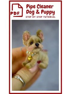 a tiny dog is being held up by someone's hand with the title pipe cleaner dog and puppy