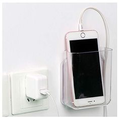 an electronic device is plugged into a wall charger