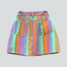 Introducing our mini colorful women's denim skirt from the 2024 Summer Collection the perfect blend of y2k mode and vibrant colors!Why You Need This Skirt in Your WardrobeThis skirt is a must-have for anyone looking to make a statement with their fashion choices. With its y2k mode and rainbow-print design, it will instantly elevate your outfit and make you stand out from the crowd. The mid-waist fit, zipper & button closure add to its functionality and make it a comfortable and stylish choice fo