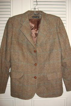 "Harve Benard's very sharp English country herringbone blazer, leather buttons, beautifully tailored 100% wool. What a preppy classic cool find! Size 4 Bust measures 36\", waist 34\", hip 38\". No flaws of any kind. Stored with TLC Comes from a smoke-free home." Formal Herringbone Blazer For Fall, Classic Notch Lapel Blazer With Herringbone Pattern, Single Button Long Sleeve Tweed Jacket For Fall, Fall Business Casual Sport Coat With Buttons, Fall Sport Coat For Business Casual, Classic Fall Tweed Jacket With Lapel Collar, Fall Tweed Jacket With Single Button And Suit Collar, Classic Herringbone Blazer For Business Casual, Classic Tweed Jacket With Lapel Collar For Fall