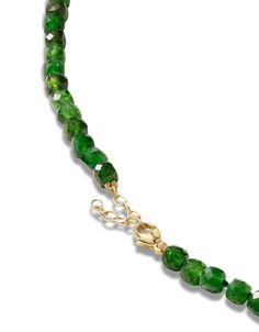 Geometrically cube shaped chrome diopside gemstone beads hand beaded in the heart of New York City and finished with 14 karat yellow gold. Chrome Diopside 14 karat gold Green Briolette Necklace In Fine Jewelry Style, Green Briolette Necklace Fine Jewelry, Green Briolette Emerald Necklace, Green Polished Beads Necklace For May Birthstone, Green Fine Jewelry Necklaces With Natural Stones, Green Natural Stones Fine Jewelry Necklace, Green Natural Stone Fine Jewelry Necklace, Green Faceted Necklace Fine Jewelry, Green Faceted Fine Jewelry Necklace