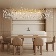 an elegant chandelier hangs from the ceiling above a dining room table