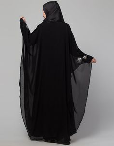 Beautiful Black Color Mirrow Work Abaya easy to wear Back close with loop, button & zip, easy to wear embroidery On Chest Hijab and band shown in the image can be bought separately Fabric: PartyCare: Mild machine wash/ hand Cold Wash/Dry cleanWe request customers to carefully choose the correct size and dress length referring to our size chart Long Black Abaya For Eid, Black Long Khimar For Eid, Black Long Sleeve Kaftan For Eid, Black Long Sleeve Hijab For Eid, Black Long Abaya, Traditional Black Dabka Khimar, Long Sleeve Black Khimar For Eid, Black Long Sleeve Khimar For Eid, Black Khimar For Eid