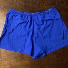 Product: Nike Aeroswift 4” Running Shorts Blue Color: Blue Size: Multiple Sizes Style: Cj7840-405 Condition: Brand New With Tags; 100% Authentic Shipping: Same Day Shipping / Next Business Day Shipping Guaranteed Questions? Feel Free To Contact Me At Anytime For Any Questions Or Concerns. Thank You! Nike Blue Activewear With Built-in Shorts, Blue Bottoms With Built-in Shorts For Running, Casual Blue Athletic Shorts For Running Errands, Blue Running Shorts With Elastic Waistband, Nike Running Bottoms With Pockets, Casual Blue Athleisure Bottoms, Nike Blue Short Leg Activewear, Blue Athletic Shorts With Pockets For Running, Nike Blue Training Shorts