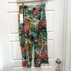 An Exuberant Tropical Print Lends Color And Style To Breezy Crinkle-Woven Pants Done In A Flowy, Wide-Legged Cropped Cut. Lay Flat Waist Measurement Is About 12” Rise Is 11.5” And Inseam Is 20” Back Zip And Clasp Closure Made In India Spring Vacation Printed Pants, Printed Ankle-length Pants For Vacation, Straight Pants For Summer Brunch, Summer Brunch Straight Pants, Multicolor Vacation Pants For Spring, Printed Summer Bottoms For Brunch, Summer Printed Bottoms For Brunch, Multicolor Spring Vacation Pants, Multicolor Pants For Spring Vacation