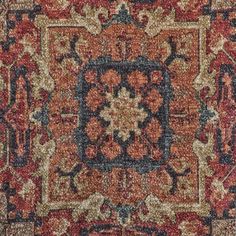 an old rug with many different colors and patterns on it's sides, including red,