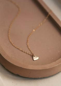 Small heart charm on a delicate 14kt Gold Fill necklace. Simple Heart Necklace, Dainty Heart Necklace, Small Heart Necklace, Tiny Heart Necklace, Book Pendant, Twist Earrings, Mom Pendant, Minimalist Necklace Gold, Everyday Wear Jewelry