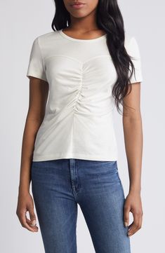 Center ruching and a bit of corset seaming beautifully shape this soft lyocell-and-cotton T-shirt. 22 1/2" length (size Medium) Crewneck Short sleeves 50% Tencel® lyocell, 50% pima cotton Tencel lyocell is a more-sustainably produced fiber made with closed-loop processing Machine wash, dry flat Made in Peru Fitted Ruched Short Sleeve T-shirt, Fitted Ruched T-shirt With Short Sleeves, Cotton Ruched Short Sleeve T-shirt, Ruched Stretch Short Sleeve T-shirt, Short Sleeve Ruched Stretch T-shirt, Ruched Fitted Elastane Top, Short Sleeve Stretch T-shirt With Ruched Detail, Ruched Elastane Tops, Cotton Ruched Fitted Top