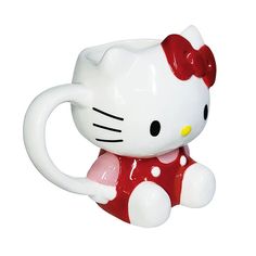 a white hello kitty mug with a red bow on it's head, sitting in front of a white background