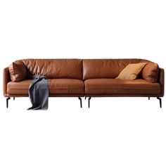 a brown leather couch with two pillows on it's back and one arm extended