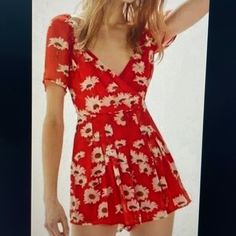 Nwt Urban Outfitters Lola Daisy Romper Faux Wrap Top Red Floral Print With Side Zip Lined With Hip Pockets Sits On The Edge Of Shoulders Trendy Red Jumpsuits And Rompers For Summer, Red Printed Jumpsuits And Rompers For Summer, Red Printed V-neck Jumpsuits And Rompers, Trendy Red Jumpsuits For Summer, Fitted Printed Jumpsuits And Rompers For Day Out, Red Printed V-neck Jumpsuit Or Romper, Red Printed V-neck Jumpsuit, Red Floral Print Short Sleeve Jumpsuits And Rompers, Flirty Summer Jumpsuits And Rompers With Short Sleeves