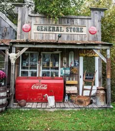 an old fashioned store with coca - colas and other items on the front porch