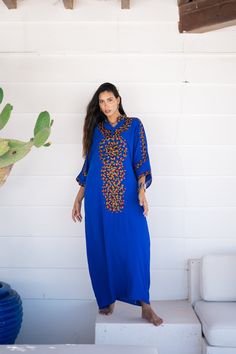 *Note : The kaftan in the video is a different color and is only displayed to show the fit, flow, and cut of the Kaftan. You will receive the one in the pictures.* A bohemian flash caftan made of light mesh of linen and poly, the fabric is unique in that it's very flowy and not the usual feel and touch of linen. This Kaftan is ideal to wear for any casual occasion. Whether taking a trip down the shopping lane, or home-based kitty parties, or about anything else, wearing this dress will make you Festive Blue Kaftan With Floral Embroidery, Blue Floral Embroidered Tunic Kurta, Blue Bohemian Kurta With Resham Embroidery, Festive Blue Embroidered Tunic, Festival Maxi Length Kaftan With Resham Embroidery, Maxi Length Kaftan With Resham Embroidery For Festivals, Festival Kaftan With Resham Embroidery In Maxi Length, Resham Embroidered Maxi Length Kaftan For Festivals, Blue Kurta With Embroidered Border For Summer