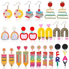 many different types of earrings with letters and numbers on them, all decorated in bright colors