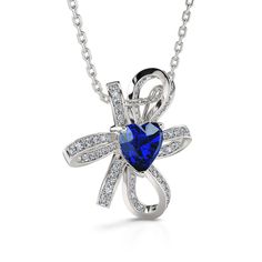 Stunning and fashionable, this necklace will capture her heart at first sight with its incomparable brilliance. Crafted in sterling silver, this piece features a blue heart-cut stone at the center of a knot of beautiful lines of white shining stones. Your love brightly radiates in every sophisticated detail of this tailored unmatched necklace that delivers feminine elegance and glamour. This design is an accessory that she will love to wear day after day.Carat Weight: 2.3 ctStone Size: 7*7 mmSto Elegant Blue Jewelry For Valentine's Day, Elegant Blue Heart Necklace, Elegant Blue Necklace With Heart Charm, Elegant Blue Necklaces With Heart Charm, Blue Necklace For Anniversary On Valentine's Day, Elegant Blue Necklaces For Valentine's Day, Formal Sapphire Heart Necklace, Fine Jewelry Sapphire Heart Cut Necklace, Elegant Sapphire Heart Pendant Necklace