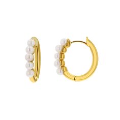 Five perfect pearls adorn this classic 14K Gold Huggie, and add a hint of sophistication and classic style. Dainty and elegant these beauties are a staple for a perfect year round stack. Wear alone for a minimal statement or layered for a perfect pearl pop! 

Size: 2.5-3mm pearl size - 10 x 12mm inside diameter 
14K Solid Gold
Made in Los Angeles
Lifetime Guarantee Classic Huggie Pearl Earrings For Anniversary, Classic Gold Pearl Huggie Earrings, Classic Pearl Huggie Jewelry, Classic Pearl Huggie Earrings, Elegant Gold Pearl Huggie Earrings, Classic Pearl Earrings For Everyday Elegance, Formal Yellow Gold Huggie Earrings With Pearl Drop, Classic Yellow Gold Pearl Earrings For Everyday Elegance, Classic Yellow Gold Pearl Earrings For Everyday