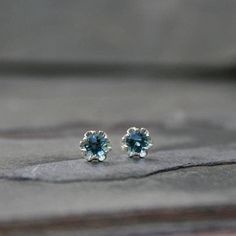 Faceted London Blue Topaz Stud Earrings, Solid Sterling Silver Posts and Earring Backs, Prong Set Ge Sterling Silver Sapphire Birthstone Earrings, Blue Round Stone Earrings For Gift, Dainty Faceted Sterling Silver Earrings, Blue Topaz Minimalist Jewelry, Dainty Blue Birthstone Earrings, Sterling Silver Round Cut Birthstone Earrings, Sapphire Round Cut Sterling Silver Earrings, Minimalist Blue Jewelry With Prong Setting, Silver Topaz Birthstone Earrings