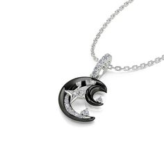 Shimmering with fascinating celestial style, this moon & star necklace draws all the right kinds of attention. Created in sterling silver, it showcases a black crescent moon adorned with glistening white stones, dots of stars, and a smaller silhouette of the moon. The fanciful design is completed with exquisite workmanship and dainty polishing details. This graceful necklace is reminiscent of the beautiful and arcane night sky. Make it a great gift for her on a special day!Carat Weight: 0.211 ct Black Star-shaped Sterling Silver Necklace, Elegant Black Jewelry With Star Charm, Elegant Black Crescent Necklace, Mystical Black Jewelry With Moon Charm, Black Mystical Jewelry With Moon Charm, Black Star Charm Pendant Jewelry, Celestial Black Crescent Jewelry, Black Crescent Celestial Jewelry, Elegant Black Moon Phase Necklace