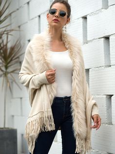 Debbie Fur Collar Bohemian Oversized Women Cardigan Oversized Fringe Sweater For Winter, Cozy Long Sleeve Outerwear With Fringe, Oversized Tassel Outerwear For Spring, Oversized Spring Outerwear With Tassels, Winter Cape With Tassels, Winter Long Sleeve Outerwear With Tassels, Winter Outerwear With Tassels And Long Sleeves, Long Sleeve Fringe Poncho For Fall, Fringe Long Sleeve Poncho For Fall