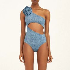 Dive into style with our denim-inspired one-piece swimsuits, complete with a matching cover-up, sarong, or wide-leg pants. This versatile set is perfect for making waves at the beach or lounging poolside. Available in various styles to suit your unique fashion sense. Spring One-piece Beachwear Swimwear, Blue Swimwear For Resort Season Sunbathing, One-piece Swimwear For Poolside Resort Season, Chic Resort Season Swimwear For Pool, Chic Summer Swimwear For Poolside, Chic Spring Swimwear For Pool, Chic Spring Pool Swimwear, Chic Swimwear For Beach Season Poolside, Chic Swimwear For Resort Season Poolside