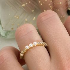 "Beautiful, 14k gold plated, dainty pearl purity ring. \"Blessed are the pure in heart...\" Matthew 5:8 <3 * Made of 925 Sterling Silver * THICK plating of 14k Gold All sales are Final Sale on all Purity Rings, so make sure you know your correct measurements + ring size! :)" Gold Stackable Pearl Ring For Anniversary, Adjustable Yellow Gold Pearl Promise Ring, Adjustable Yellow Gold Pearl Ring For Promise, Dainty Pearl Stackable Rings For Anniversary, Gold Pearl Promise Ring In 14k Gold, Gold Pearl Stackable Rings For Anniversary, Gold Pearl Ring For Promise - Fine Jewelry, Gold Pearl Ring For Promise, Gold Pearl Promise Ring In Fine Jewelry Style