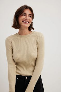 Ribbed Knitted Round Neck Sweater Beige | NA-KD Beige Stretch Crew Neck Sweater, Trendy Ribbed Cream Knit Top, Beige Ribbed Stretch Sweater, Classic Long Sleeve Ribbed Knit Top, Beige Stretch Ribbed Sweater, Classic Stretch Sweater With Ribbed Neckline, Beige Stretch Knit Top With Ribbed Neckline, Cream Ribbed Stretch Knit Top, Trendy Beige Ribbed Knit Top