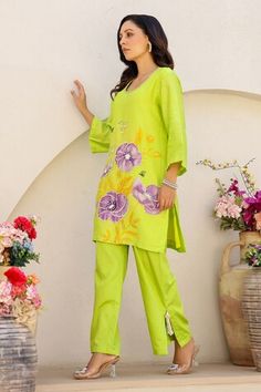 Green kurta with floral print, highlighted with sequin and pearl embroidery. Paired with a green pant with tasseled side slits and printed dupatta with a gold fringed border. - Aza Fashions Pista Green Semi-stitched Sets For Spring, Pista Green Floral Print Sets For Spring, Green Embroidered Pant Set For Summer, Green Straight Kurta Pant Set For Spring, Pista Green Traditional Wear With Floral Embroidery For Spring, Traditional Green Pant Set With Floral Embroidery, Spring Designer Wear Sets In Pista Green, Festive Spring Sets With Printed Motifs, Spring Pista Green Salwar Kameez