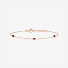 With this 14K gold Ruby Station Bracelet, now your birthstone can decorate your wrist! - Handcrafted in 14k solid gold set with a high-quality natural emerald gemstone.- Chain length is adjustable from 6 to 7 inches.- Bead height: 5 mm.- Bead width: 5 mm.- 100% US sourced. 1 2 14k Solid GoldMade of long lasting, nature friendly recycled gold. 14k gold does not oxidize or discolor making it a perfect option for daily wear. Adjustable Yellow Gold Chain Bracelet With Birthstone, Adjustable Yellow Gold Birthstone Chain Bracelet, Yellow Gold Birthstone Bracelet Fine Jewelry, Fine Jewelry Yellow Gold Birthstone Bracelet, Yellow Gold Fine Jewelry Bracelet With Birthstone, Adjustable 14k Gold Bracelet With Birthstone, Classic Yellow Gold Bracelet With Birthstone, Classic Yellow Gold Birthstone Bracelet, 14k Gold Gemstone Bracelets For May Birthstone