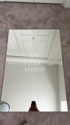 a mirror with the words diy anthropologie inspired mirror on it